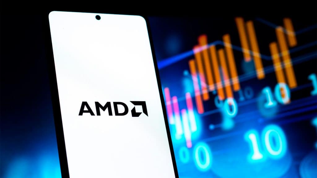 Celular com logotipo da AMD na tela e linhas de ações financeiras ao fundo